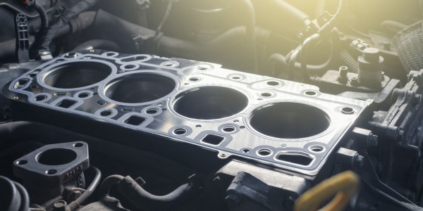 What is the head gasket and how does it work?